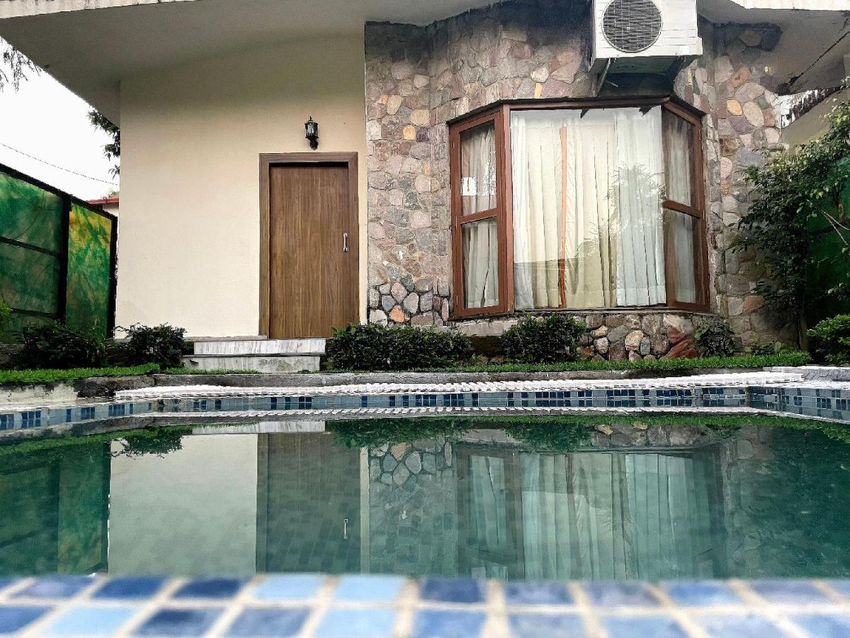 Country Inn Tarika Riverside Resort Jim Corbett Garjia Bagian luar foto